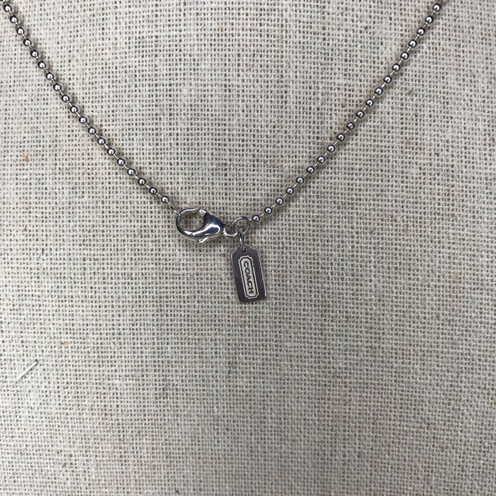 Coach baby tag silver bead necklace
